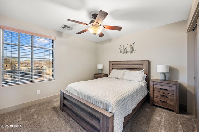 carpeted bedroom with ceiling fan