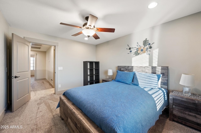 carpeted bedroom featuring ceiling fan