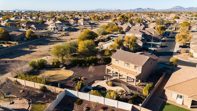 birds eye view of property featuring a mountain view