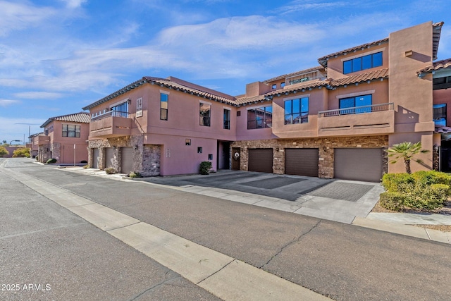 view of front of home with a garage