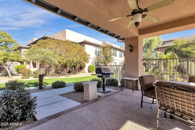 view of patio / terrace featuring a grill and ceiling fan