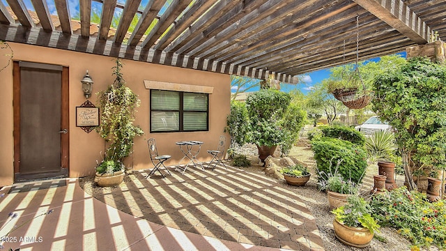 view of patio featuring a pergola