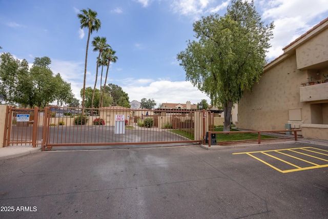 gate featuring a residential view