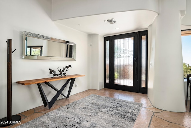 foyer entrance featuring plenty of natural light