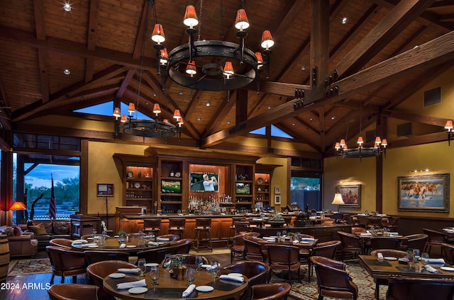 misc room featuring beam ceiling, bar, a notable chandelier, and wood ceiling