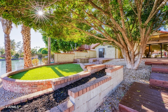 view of yard with a water view