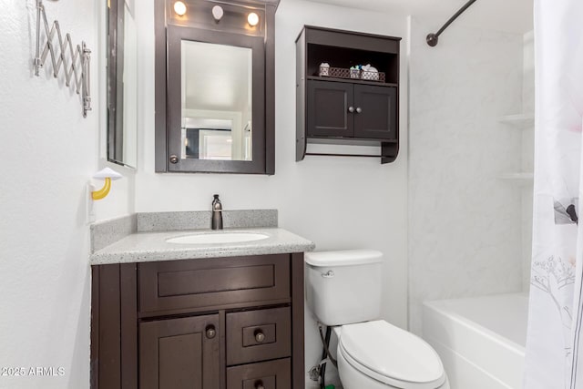 full bathroom with vanity, toilet, and shower / tub combo