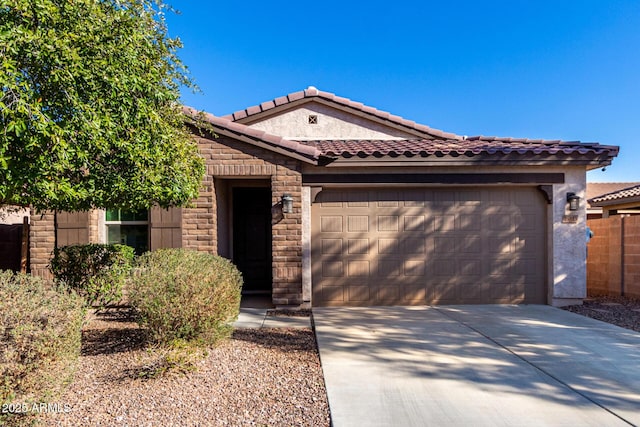 view of front of home with a garage