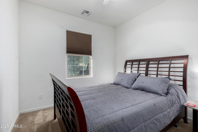 bedroom with ceiling fan and carpet