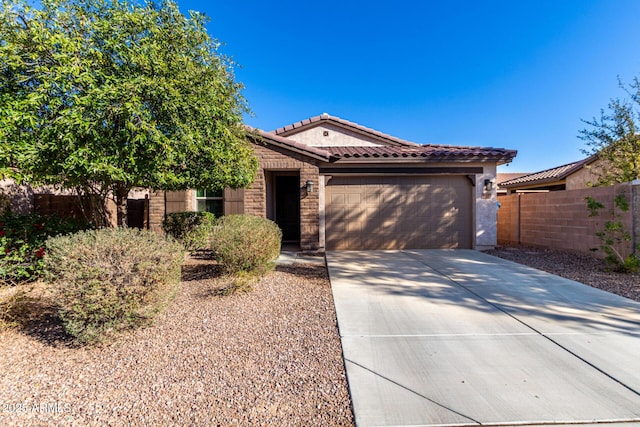 view of front of home with a garage