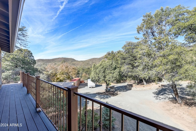 balcony featuring a mountain view