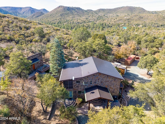 drone / aerial view featuring a mountain view