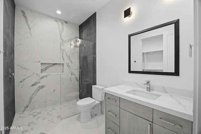 full bathroom featuring a marble finish shower, toilet, recessed lighting, marble finish floor, and vanity