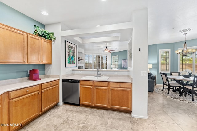 kitchen with stainless steel dishwasher, plenty of natural light, sink, and ceiling fan with notable chandelier