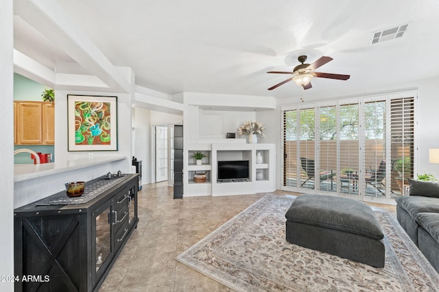 living room featuring ceiling fan