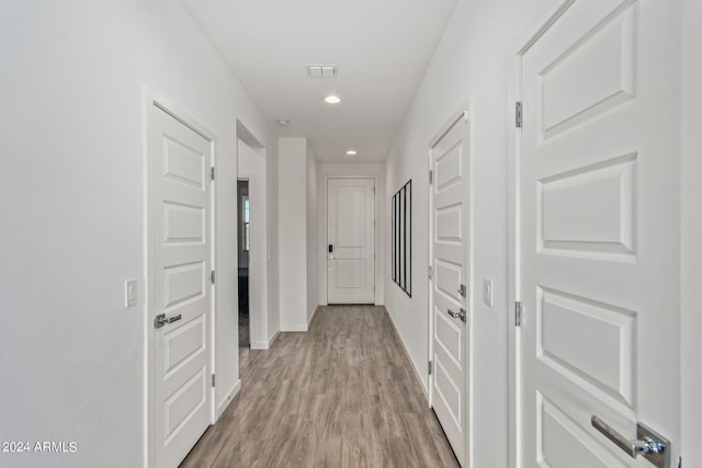 hallway featuring light wood-type flooring