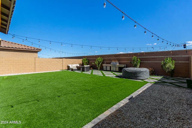 view of yard with a patio and an outdoor living space