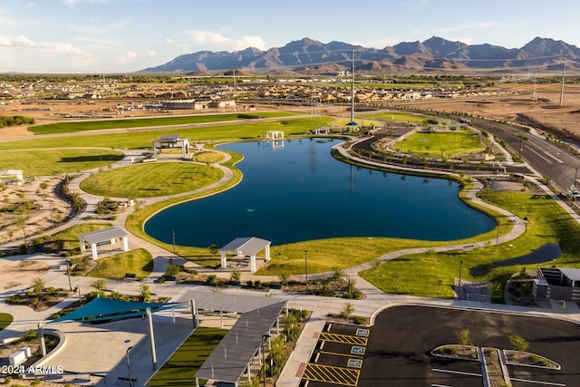 aerial view featuring a water and mountain view