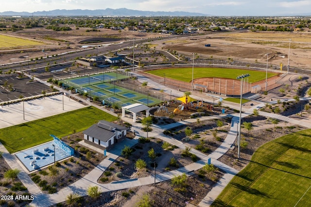 birds eye view of property featuring a mountain view