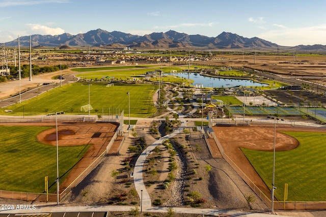 bird's eye view featuring a water and mountain view