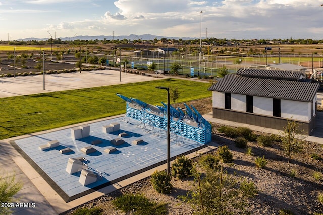 birds eye view of property with a mountain view