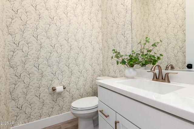 1248 E Jude Ln, Gilbert, AZ 85298 - bathroom with wallpapered walls, vanity, toilet, and baseboards