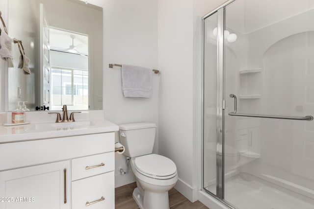 1248 E Jude Ln, Gilbert, AZ 85298 - bathroom featuring toilet, a stall shower, vanity, and wood finished floors