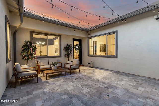 1248 E Jude Ln, Gilbert, AZ 85298 - patio terrace at dusk with a patio and outdoor lounge area