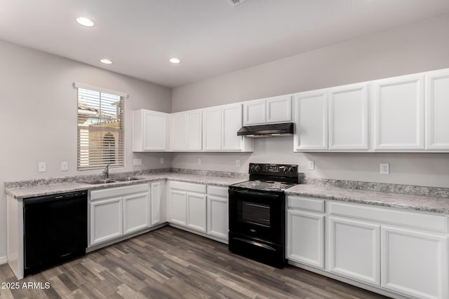 kitchen with sink, black appliances, dark hardwood / wood-style floors, and white cabinets