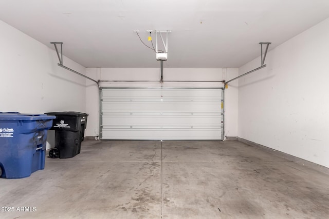 garage featuring a garage door opener