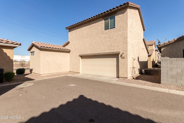 exterior space featuring a garage