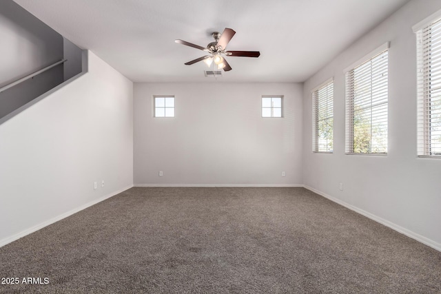 carpeted empty room with ceiling fan