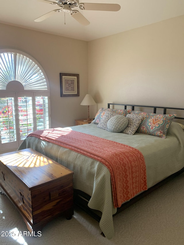 bedroom featuring carpet floors and ceiling fan