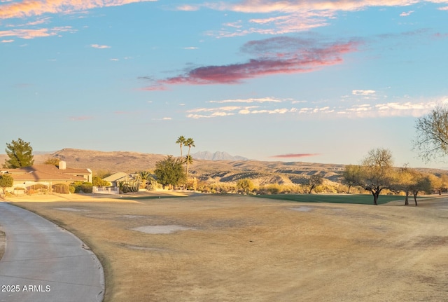 surrounding community with a mountain view