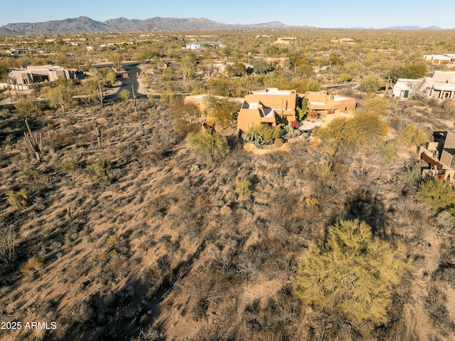 drone / aerial view featuring a mountain view