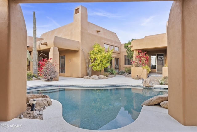 pool featuring a patio