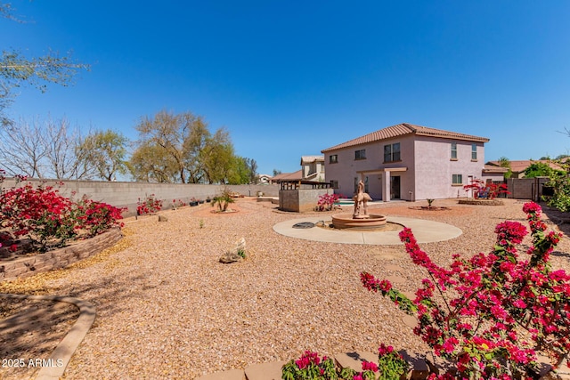 view of yard with a fenced backyard and a patio