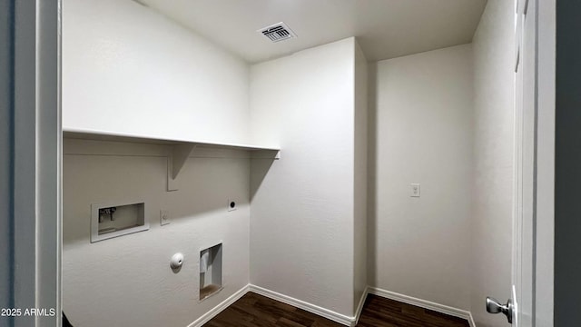 19841 W Cherry Lynn Rd W, Buckeye, AZ 85396 - laundry room with hookup for a gas dryer, washer hookup, dark wood-style flooring, and hookup for an electric dryer