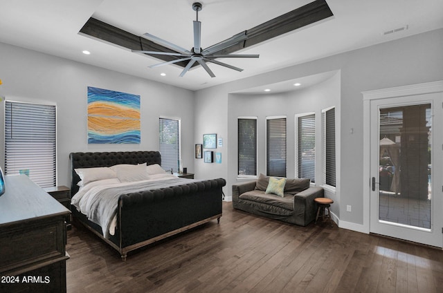 bedroom featuring dark wood-type flooring, ceiling fan, and access to outside