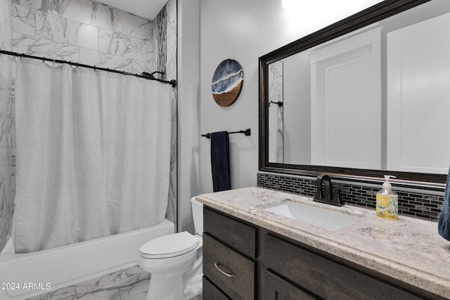 full bathroom with vanity, toilet, backsplash, and shower / bath combo with shower curtain