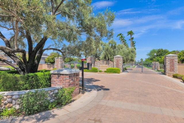 3749 E Juniper Cir, Mesa, AZ 85205 - view of street featuring a gate and a gated entry