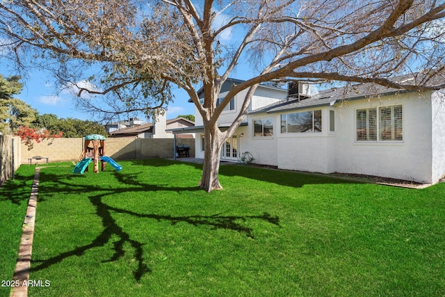 view of yard with a playground