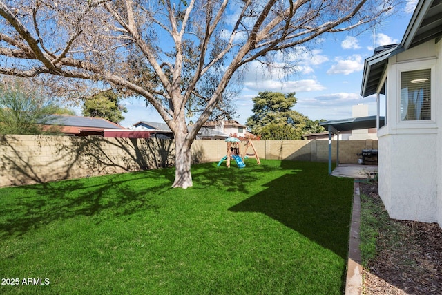 view of yard with a playground