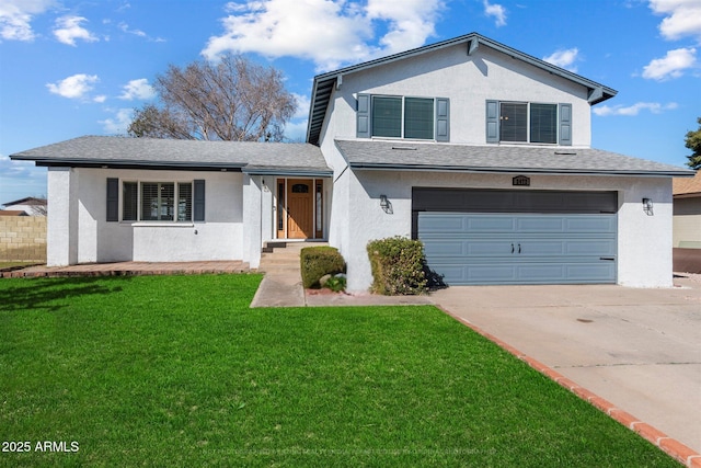 view of front of house with a garage and a front lawn