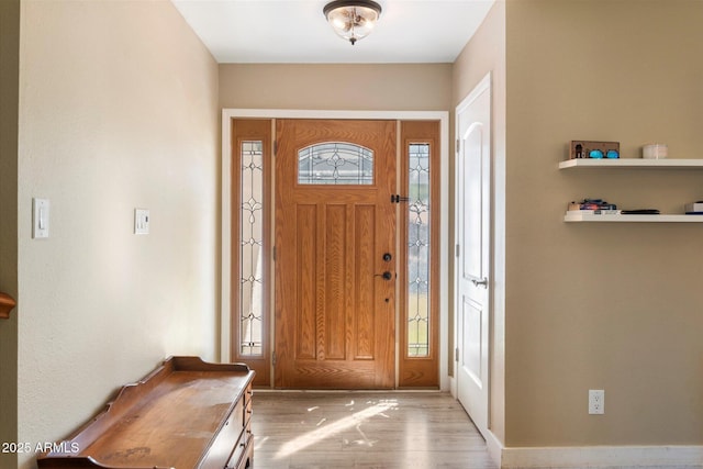 foyer entrance featuring light hardwood / wood-style flooring