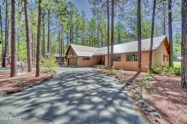 rustic home with metal roof