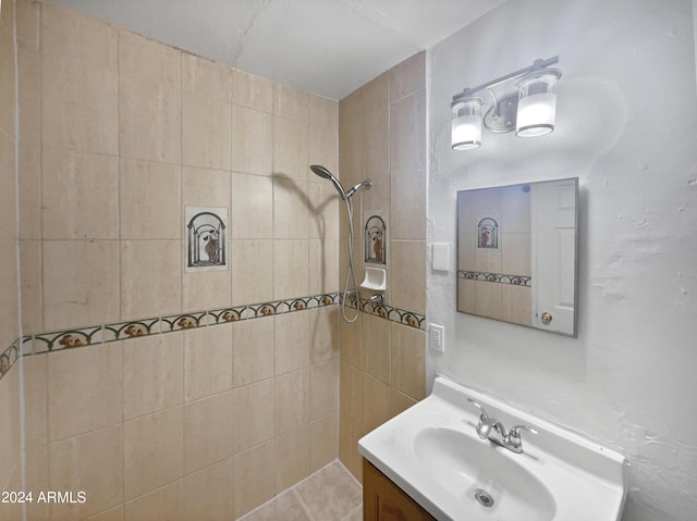 bathroom with tile patterned flooring and vanity