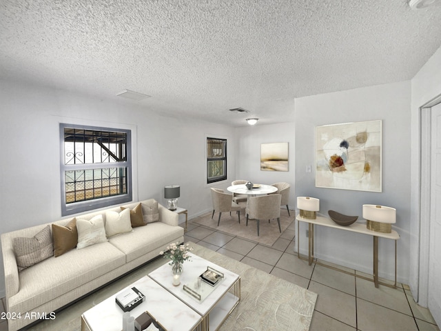 living room featuring light tile patterned floors and a textured ceiling