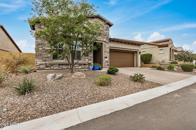 view of front of house with driveway, a garage, stone siding, a tile roof, and stucco siding