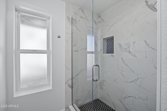 bathroom featuring an enclosed shower